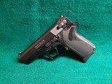 SMITH & WESSON - MODEL 3914. BLUED. DA/SA. 3.5" BBL. W-ONE MAGAZINE. VERY NICE!CIRCA 1990'S - 9MM LUGER - 4 of 14