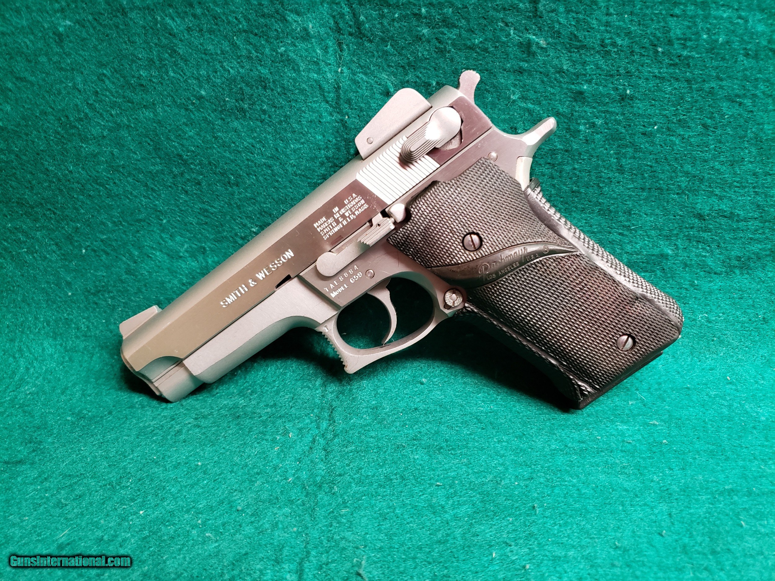 SMITH & WESSON - MODEL 659. STAINLESS. DA/SA. 4