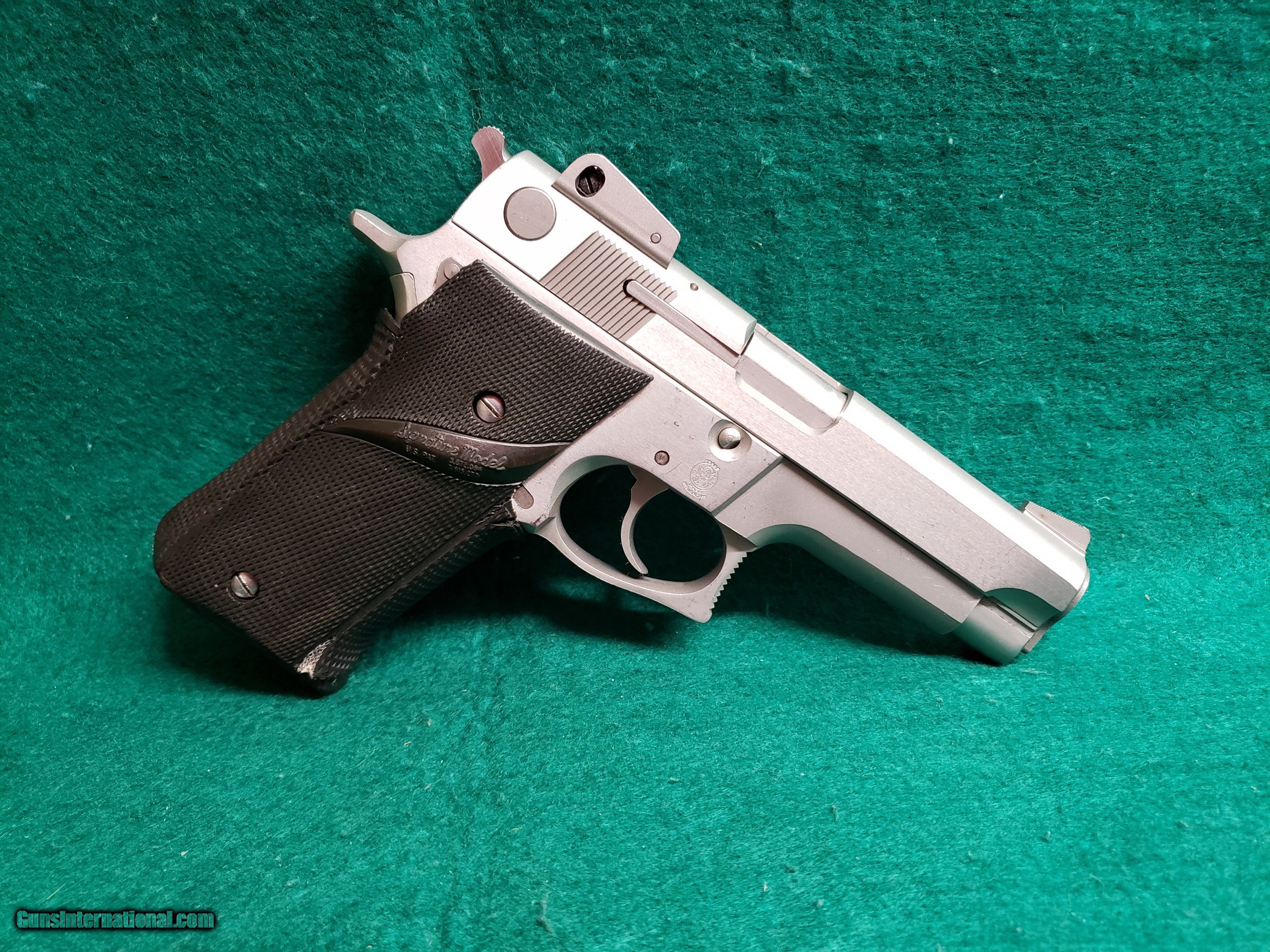 SMITH & WESSON - MODEL 659. STAINLESS. DA/SA. 4