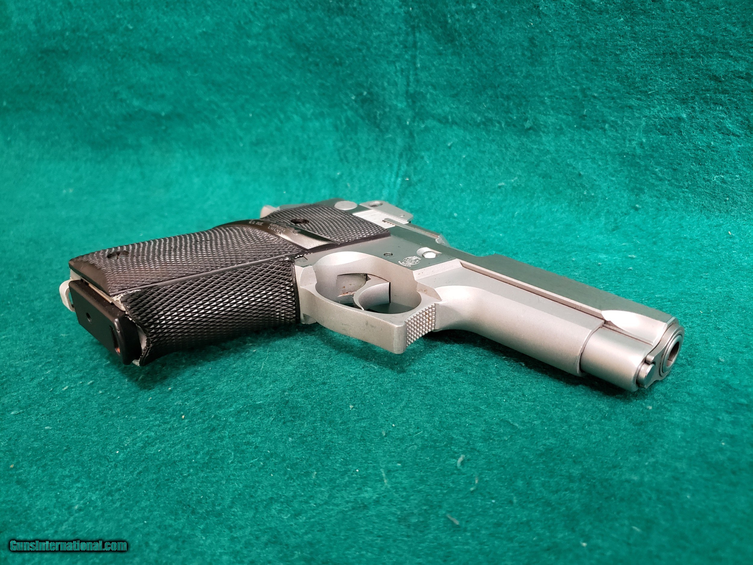 SMITH & WESSON - MODEL 659. STAINLESS. DA/SA. 4