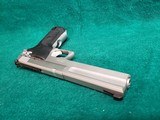 SMITH & WESSON - MODEL 2206. STAINLESS STEEL. 6" BBL. W-MAG. NEAR MINT W-CHERRY BORE! CIRCA MID 1990'S - .22 LR - 13 of 16