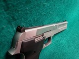 SMITH & WESSON - MODEL 2206. STAINLESS STEEL. 6" BBL. W-MAG. NEAR MINT W-CHERRY BORE! CIRCA MID 1990'S - .22 LR - 8 of 16