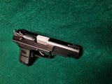 RUGER - P89DC. "DECOCKER ONLY". SEMI-AUTO. BLUED. 4.5" BBL. W-MAG. GOOD CONDITION. MFG. IN 1993 - 9MM LUGER - 2 of 9