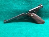 COLT-BULLSEYE MATCH TARGET WOODSMAN W/ ORIGINAL MAGAZINE-MFG.1941-.22 L.R.-BRIGHT FINISH AND FACTORY ELEPHANT EAR GRIPS- GREAT CONDITION APROX. 85% - 17 of 25