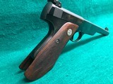 COLT-BULLSEYE MATCH TARGET WOODSMAN W/ ORIGINAL MAGAZINE-MFG.1941-.22 L.R.-BRIGHT FINISH AND FACTORY ELEPHANT EAR GRIPS- GREAT CONDITION APROX. 85% - 5 of 25