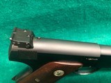 COLT-BULLSEYE MATCH TARGET WOODSMAN W/ ORIGINAL MAGAZINE-MFG.1941-.22 L.R.-BRIGHT FINISH AND FACTORY ELEPHANT EAR GRIPS- GREAT CONDITION APROX. 85% - 7 of 25