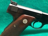 COLT-BULLSEYE MATCH TARGET WOODSMAN W/ ORIGINAL MAGAZINE-MFG.1941-.22 L.R.-BRIGHT FINISH AND FACTORY ELEPHANT EAR GRIPS- GREAT CONDITION APROX. 85% - 6 of 25