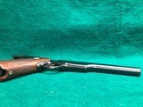 COLT-BULLSEYE MATCH TARGET WOODSMAN W/ ORIGINAL MAGAZINE-MFG.1941-.22 L.R.-BRIGHT FINISH AND FACTORY ELEPHANT EAR GRIPS- GREAT CONDITION APROX. 85% - 13 of 25