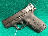 SMITH AND WESSON MP9 SHIELD 9MM CALIBER - 1 of 4