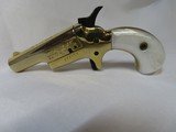 BUTLER-DERRINGER-.22 L.R. - 2 of 14