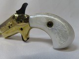 BUTLER-DERRINGER-.22 L.R. - 4 of 14