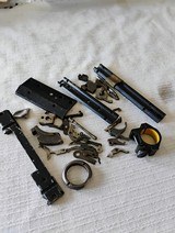 Mixed gun parts