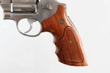 SMITH & WESSON
657
STAINLESS
8 3/8"
41 MAG
WOOD GRIPS
6 ROUND
EXCELLENT - 6 of 16