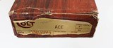 COLT
ACE
BLUED
5"
.22 LR
10
DIAMOND CHECKERED WOOD
1978
NEW (OLD STOCK)
FACTORY BOX - 19 of 19