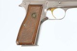 BROWNING
HI POWER
9MM
YR 1981
NICKEL/SILVER CHROME FINISH
13 ROUND
WOOD RED BACKED GRIPS - 2 of 15