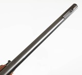 REMINGTON
MODEL 1100
12 GAUGE
SHOTGUN
WITH SCOPE - 12 of 16