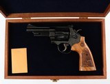 SMITH & WESSON
MODEL 29-10
44 MAGNUM
REVOLVER
(ENGRAVED) - 15 of 18