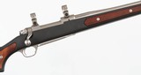 RUGER
M77 MARK II
7.62 x 39
RIFLE
(1991 YEAR MODEL - ZYTEL STOCK WITH WOOD INSERTS) - 7 of 15