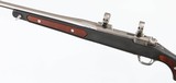 RUGER
M77 MARK II
7.62 x 39
RIFLE
(1991 YEAR MODEL - ZYTEL STOCK WITH WOOD INSERTS) - 4 of 15