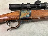 Dakota Model 10-
7X57mm, highly figured stock and case color, Leupold ultralight scope, Talley rings - 2 of 10