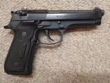 Beretta 92F w Crimson Trace laser grips - 1 of 3