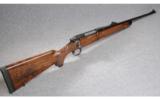 Remington Model 700 with Don Allen Custom Stock .375 H&H Mag. - 1 of 9
