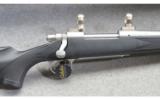 Remington Model 700 Stainless Synthetic .338 Win. Mag. - 2 of 7