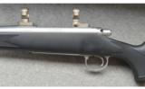 Remington Model 700 Stainless Synthetic .338 Win. Mag. - 4 of 7