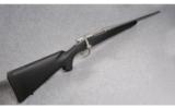 Remington Model 700 Stainless/Synthetic .338 Win. Mag. - 1 of 9