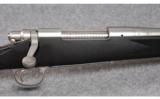 Remington Model 700 Stainless/Synthetic .338 Win. Mag. - 2 of 9