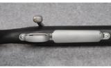 Remington Model 700 Stainless/Synthetic .338 Win. Mag. - 3 of 9