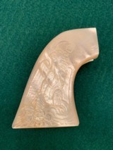 1880 2 piece mother of pearl Mexican eagle grips deep relief carved eagle and snake on right side for model 1873 SAA Colt - 1 of 4