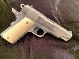 Colt Commander .45 ACP, 4 1/4 ‘’barrel, fully hand engraved & polished by a top engraver & polished by Flannery Colt Commander .45 ACP, 4 1/4 ‘’barrel - Image 1 of 7