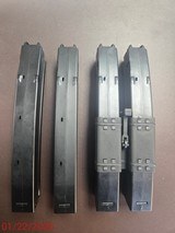 Heckler and Koch (HK) M94, SP5, MP5 30 Round factory mags and clamp - 2 of 2