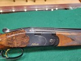 Beretta 686 Onyx pro field combo 20ga and a 28ga with a 28in barrel with exquisite wood stock - 11 of 13