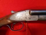 L C SMITH SPECIALTY GRADE, 20 gauge, Ejectors, 'One'single selective
trigger, one of about 15, w/letter
- 1 of 12