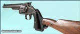 Smith & Wesson
"STOCKED AMERICAN MODEL"
Revolver - 9 of 11