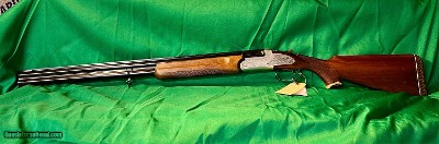 Zoli O/U Shotgun, Cal. 12 2 3/4, Barrel Length 28, LOP 14 1/4, Chokes IM, M, Weight 7.4 lbs