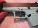 GLOCK 43, 9mm, Gently Used, Robin Egg Blue frame, Streamlight TLR-6, 3 mags, Trijicon site - 4 of 13