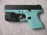 GLOCK 43, 9mm, Gently Used, Robin Egg Blue frame, Streamlight TLR-6, 3 mags, Trijicon site - 2 of 13