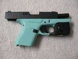 GLOCK 43, 9mm, Gently Used, Robin Egg Blue frame, Streamlight TLR-6, 3 mags, Trijicon site - 12 of 13