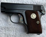 Colt 1908 pocket hammerless .25 Mfg 1940 Absolute Mint condition, wood grip panels