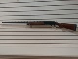 REMINGTON MODEL 1100 12 GAUGE - 1 of 8