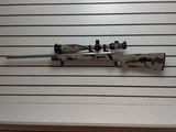 USED REMINGTON MODEL 700 WITH MILLET SCOPE - 1 of 12