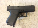 USED GLOCK MODEL 43 9MM IN HARD PLASTIC CASE WITH EXTRA CLIP AND 2 SPEED LOADERS PRICED TO MOVE - 2 of 9