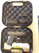 USED GLOCK MODEL 43 9MM IN HARD PLASTIC CASE WITH EXTRA CLIP AND 2 SPEED LOADERS PRICED TO MOVE - 1 of 9