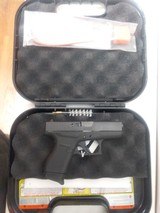 USED GLOCK MODEL 42 380ACP ORIGINAL BOX AND MANUALS - 1 of 9