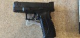 USED SPRINGFIELD XDM 9MM WITH ORIGINAL CASE, SPEED LOADER, EXTRA BUTT GAURDS,LOCK , HOLSTER,EXTRACLIP , DUAL CLIP HOLDER - 7 of 21