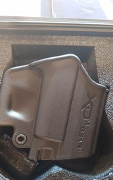 USED SPRINGFIELD XDM 9MM WITH ORIGINAL CASE, SPEED LOADER, EXTRA BUTT GAURDS,LOCK , HOLSTER,EXTRACLIP , DUAL CLIP HOLDER - 19 of 21