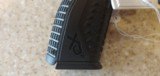 USED SPRINGFIELD XDM 9MM WITH ORIGINAL CASE, SPEED LOADER, EXTRA BUTT GAURDS,LOCK , HOLSTER,EXTRACLIP , DUAL CLIP HOLDER - 13 of 21